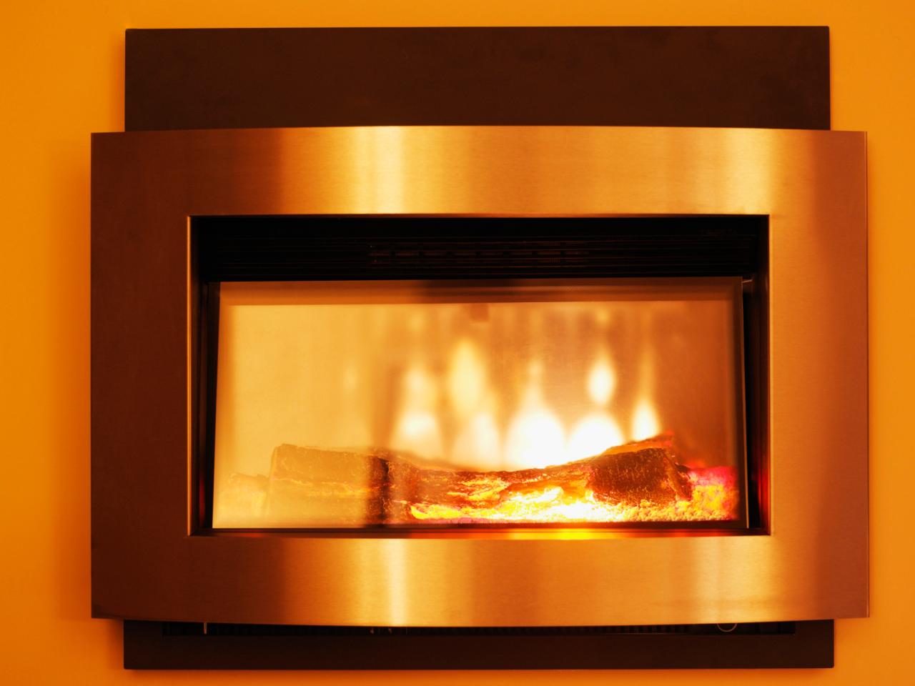 can a gas fireplace burn wood